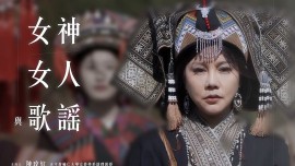 the face of a woman in traditional costume